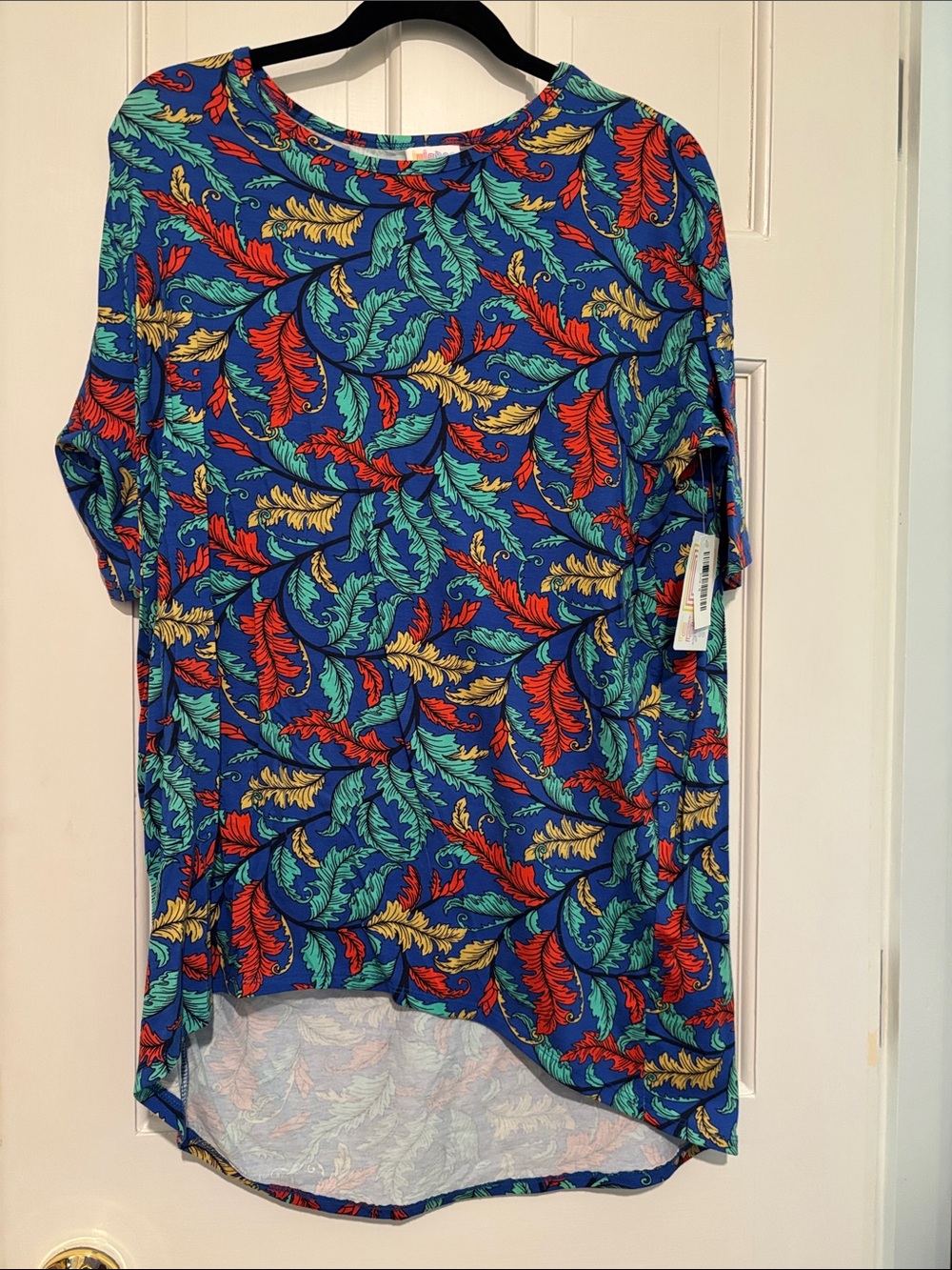 LuLaRoe Short Sleeve Tee in Blue with Red, Green & Yellow Feather Print